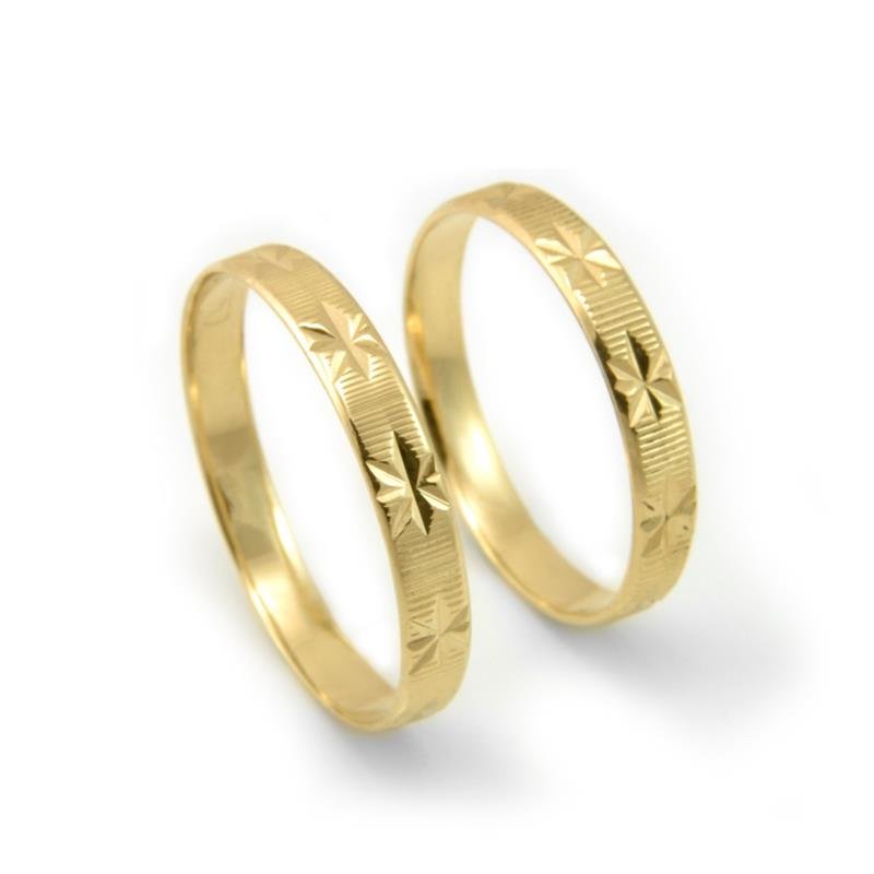 ALIANÇA DE OURO 18KL PESO 1,6 GRAMAS E LARGURA DE 3,0MM TRABALHADA