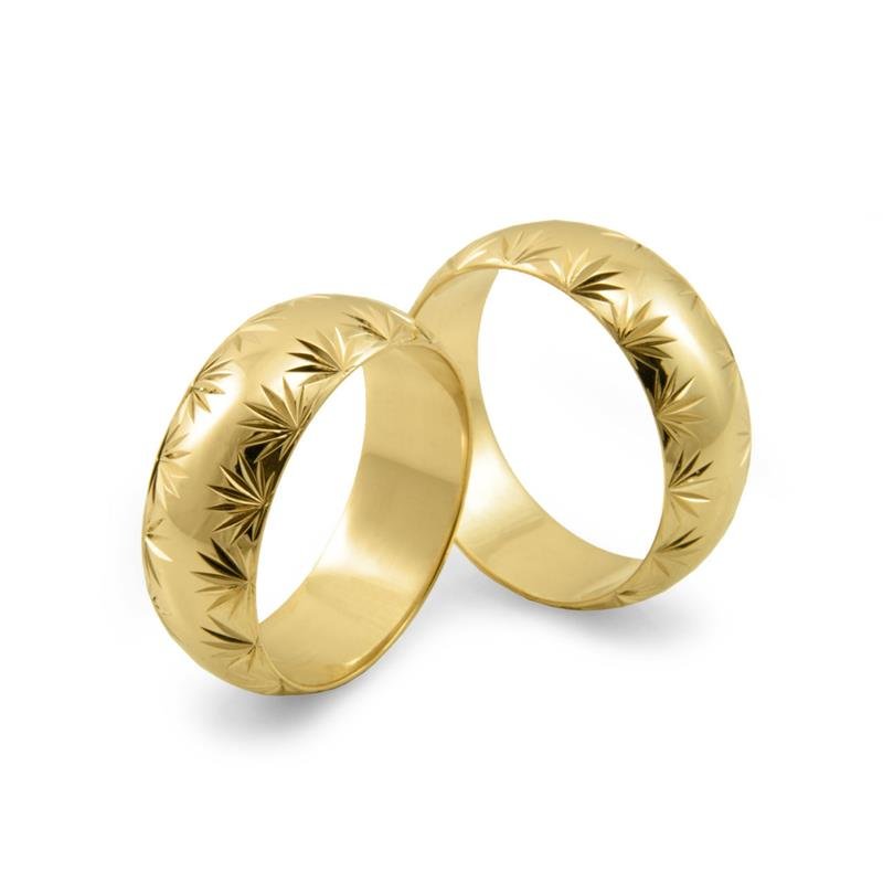 ALIANÇA DE OURO 18KL PESO 7,1 GRAMAS E LARGURA DE 7,0MM ABAULADA TRABALHADA