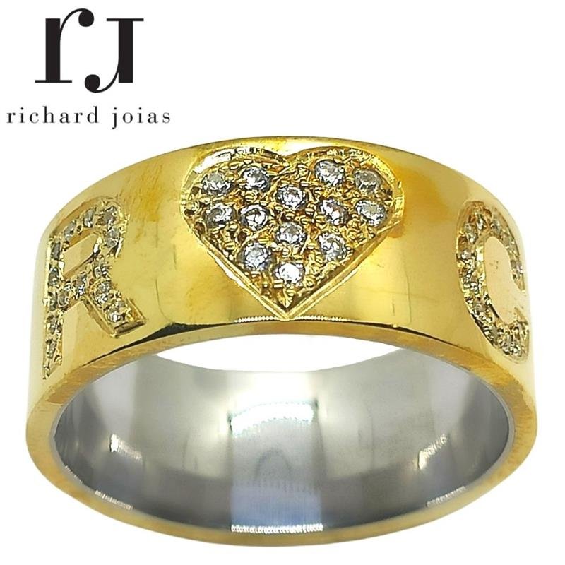 ALIANÇA DE MOEDA C/FORRO DE AÇO 10MM ANATÔMICA QUADRADA CORAÇÃO E LETRAS CRAVEJADO QT DE PEDRAS CONFORME AS LETRAS