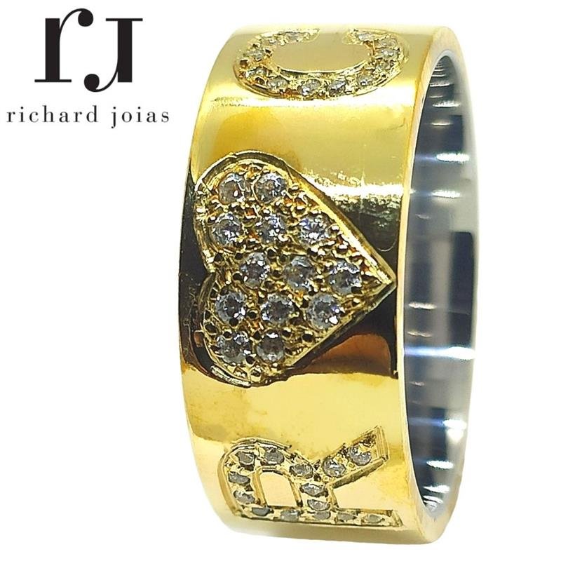 ALIANÇA DE MOEDA C/FORRO DE AÇO 10MM ANATÔMICA QUADRADA CORAÇÃO E LETRAS CRAVEJADO QT DE PEDRAS CONFORME AS LETRAS