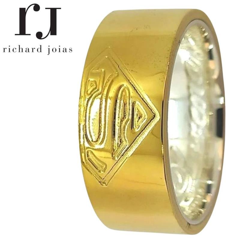 ALIANÇA DE MOEDA C/FORRO DE PRATA 10M ANATÔMICA QUADRADA E SIMBOLO DO SUPERMAN